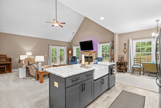 2092 Pleasant Grove Rd, Blairsville, GA 30512 - kitchen with dishwasher, a sink, gray cabinets, open floor plan, and high vaulted ceiling