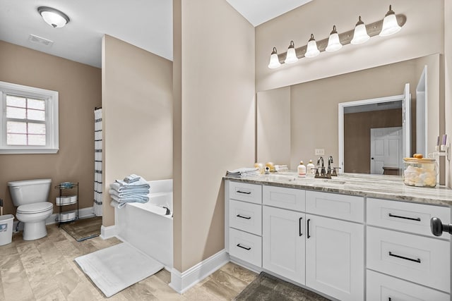 2092 Pleasant Grove Rd, Blairsville, GA 30512 - bathroom featuring vanity, a bath, toilet, and baseboards