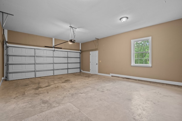 2092 Pleasant Grove Rd, Blairsville, GA 30512 - garage with baseboards and a garage door opener