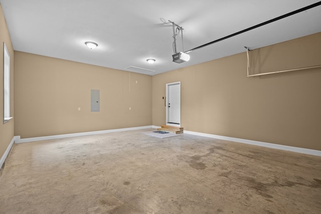 2092 Pleasant Grove Rd, Blairsville, GA 30512 - garage featuring electric panel, a garage door opener, and baseboards