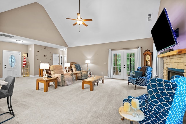 2092 Pleasant Grove Rd, Blairsville, GA 30512 - living room with high vaulted ceiling, carpet floors, a ceiling fan, a stone fireplace, and baseboards
