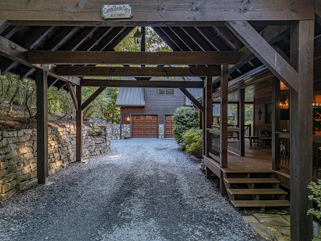 view of car parking with a garage