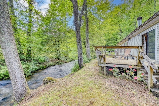 view of yard with a deck