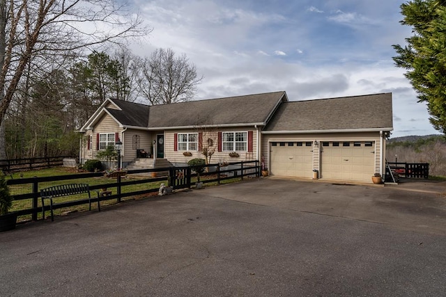 single story home with a garage