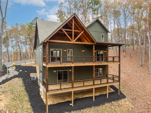 back of house with a balcony