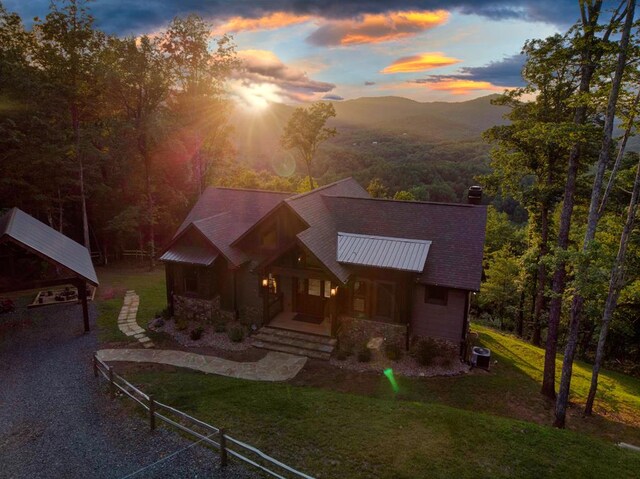 370 High Ridge Rd, Epworth, GA 30513 - chalet / cabin featuring covered porch, a front lawn, cooling unit, and stone siding