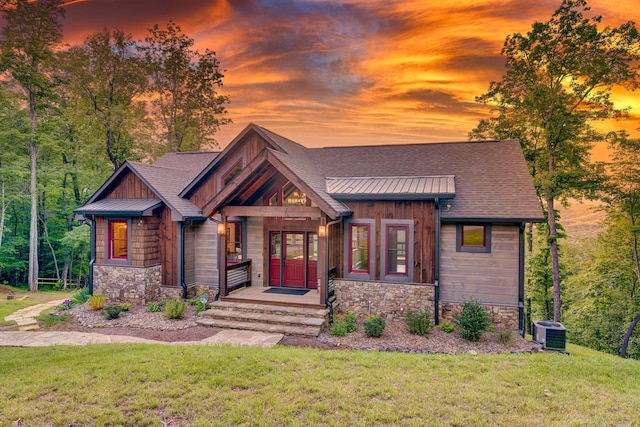 370 High Ridge Rd, Epworth, GA 30513 - view of front of house featuring a front lawn, stone siding, central air condition unit, and a shingled roof