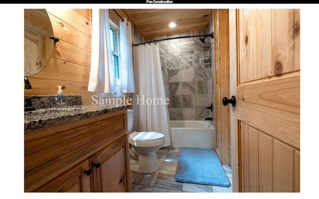 full bathroom with vanity, shower / bath combination with curtain, and toilet