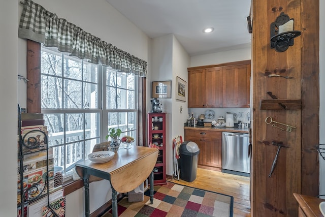 kitchen featuring light hardwood / wood-style floors and dishwasher