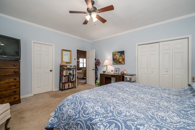 bedroom with crown molding, light colored carpet, a closet, and ceiling fan