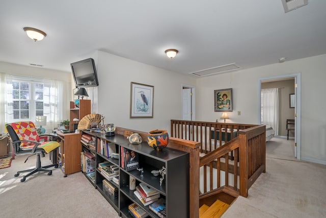 interior space featuring a wealth of natural light and light carpet