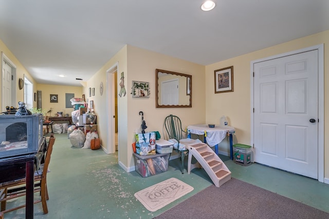 interior space featuring concrete floors