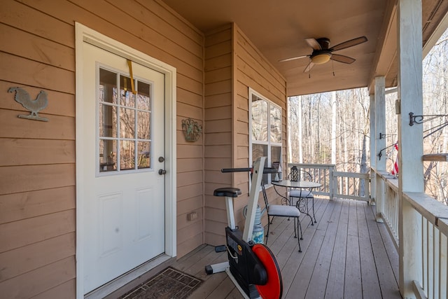 exterior space featuring a porch and ceiling fan