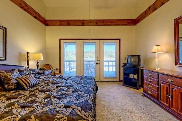 bedroom featuring light colored carpet, access to exterior, and french doors