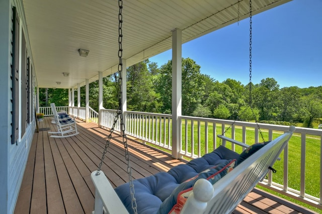 deck featuring a yard