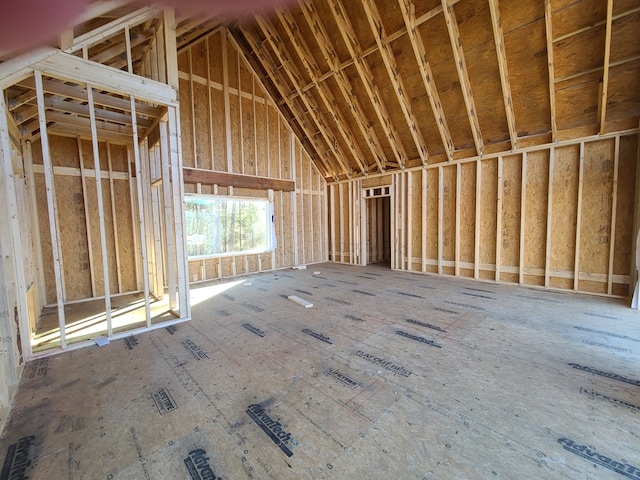 misc room with vaulted ceiling