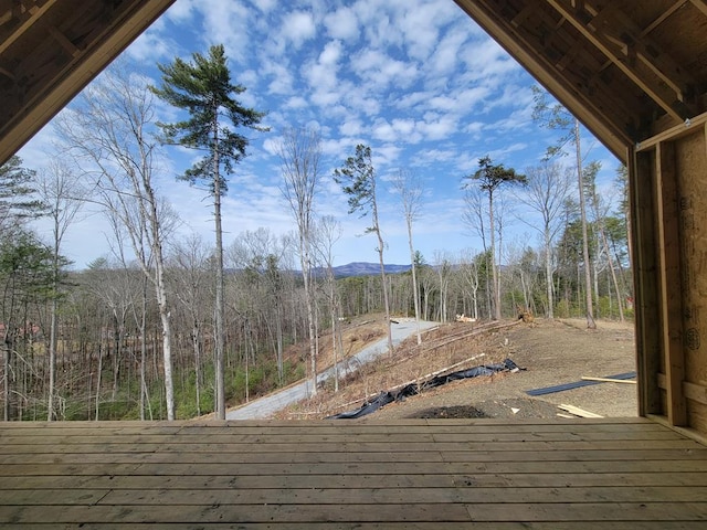 exterior space featuring a forest view