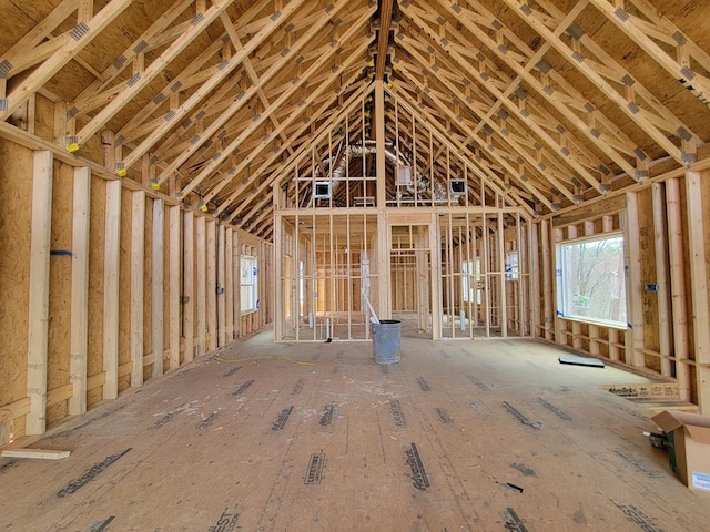 misc room featuring lofted ceiling