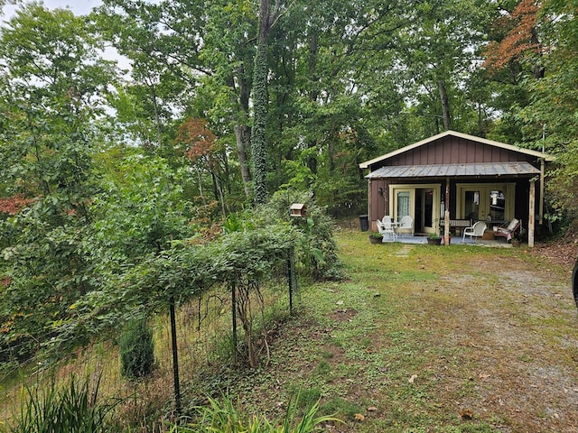 view of yard with french doors