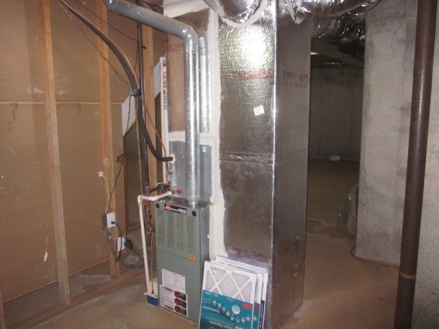 629 Camp Branch Rd, Ellijay, GA 30540 - utility room with heating unit