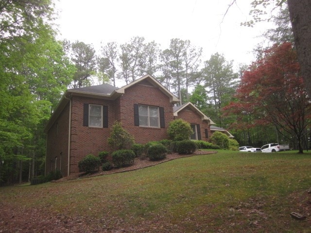 629 Camp Branch Rd, Ellijay, GA 30540 - view of front of home with brick siding and a front lawn