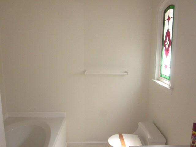629 Camp Branch Rd, Ellijay, GA 30540 - bathroom featuring toilet and vanity