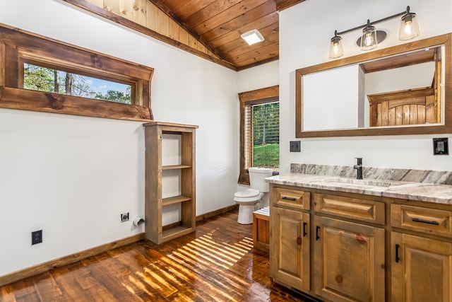 bathroom featuring vanity, lofted ceiling, wooden ceiling, hardwood / wood-style flooring, and toilet