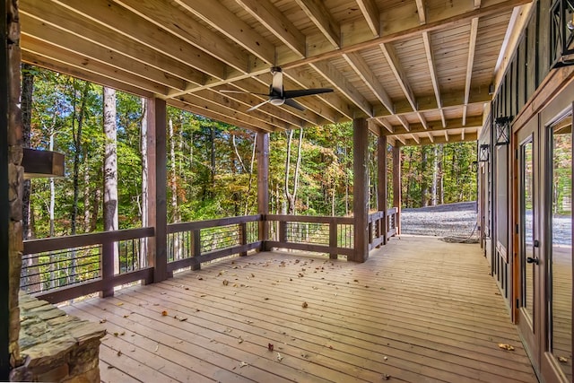 wooden deck featuring ceiling fan