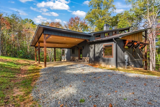 contemporary house with a carport