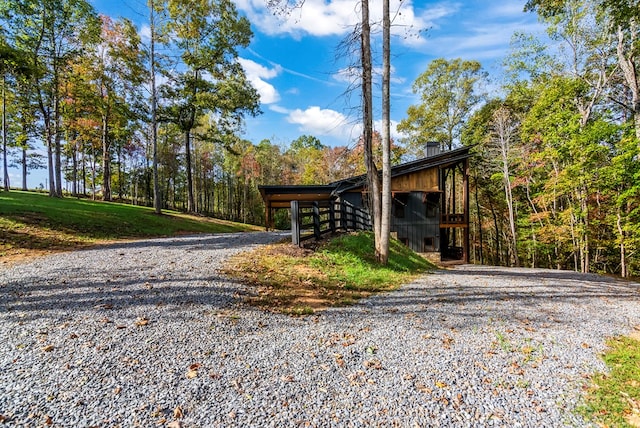 exterior space with a carport