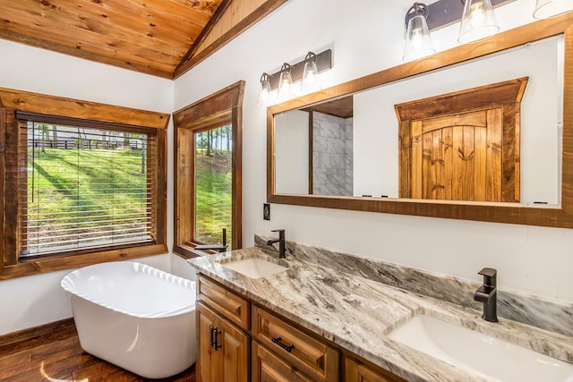 bathroom with vanity, a bath, wooden ceiling, hardwood / wood-style floors, and lofted ceiling