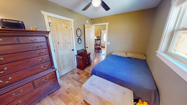 bedroom featuring ceiling fan and light wood-type flooring