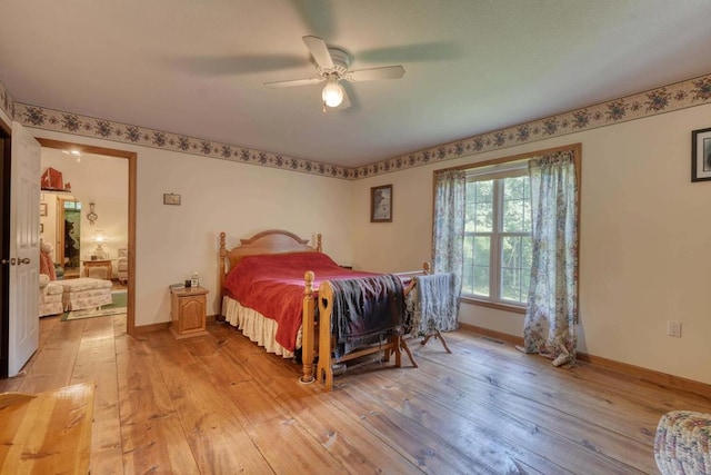 bedroom featuring ceiling fan and light wood-type flooring