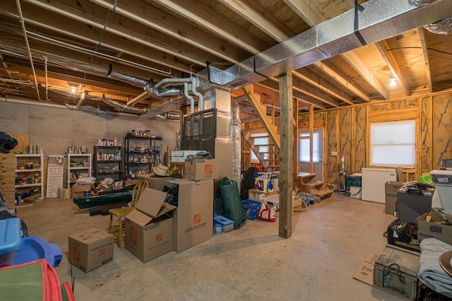 basement with white fridge