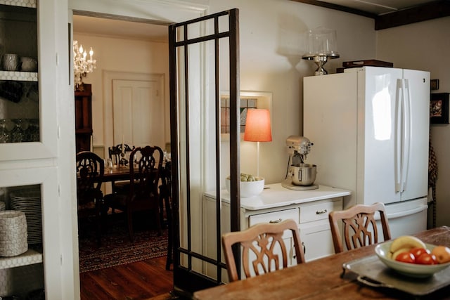 477 W First St, Blue Ridge, GA 30513 - dining room featuring wood finished floors and a chandelier