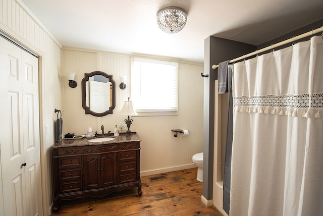 477 W First St, Blue Ridge, GA 30513 - bathroom with hardwood / wood-style floors, vanity, a shower with shower curtain, and crown molding