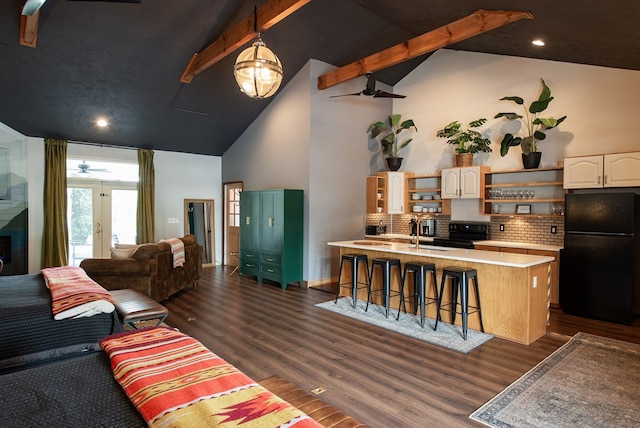477 W First St, Blue Ridge, GA 30513 - living room featuring high vaulted ceiling, dark wood finished floors, beamed ceiling, ceiling fan, and recessed lighting