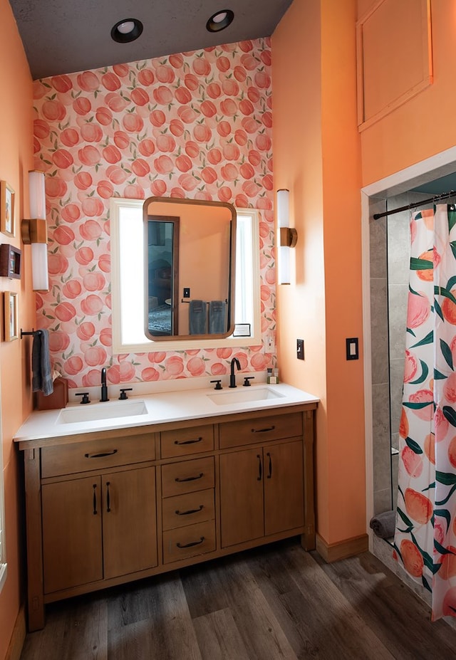 477 W First St, Blue Ridge, GA 30513 - bathroom featuring wood finished floors, double vanity, and a shower with shower curtain