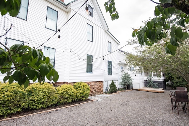 477 W First St, Blue Ridge, GA 30513 - view of side of property featuring a hot tub, a patio, and a deck