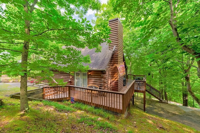 exterior space featuring a wooden deck