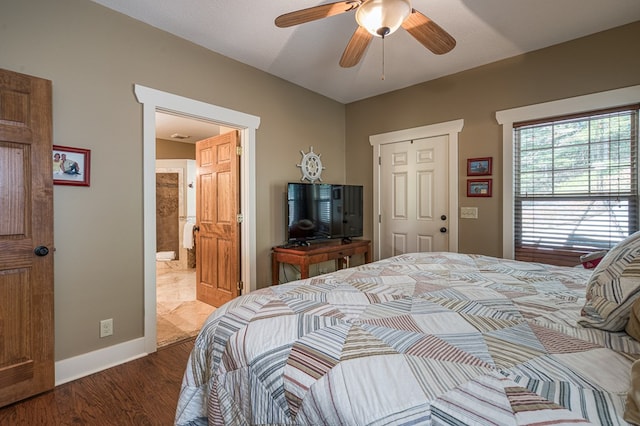 249 Whispering Pine Trl, Murphy, NC 28906 - bedroom featuring wood finished floors, baseboards, ceiling fan, ensuite bath, and a closet