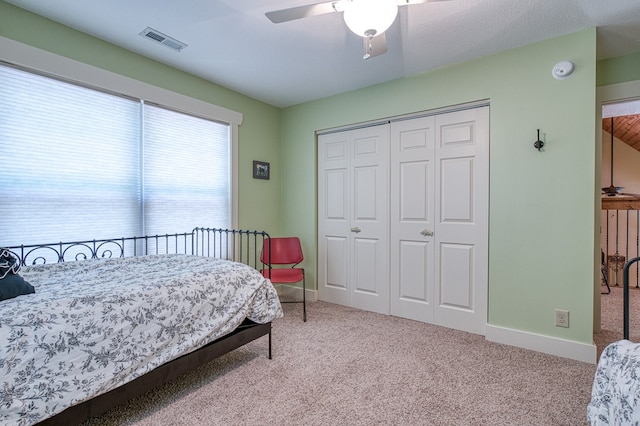 249 Whispering Pine Trl, Murphy, NC 28906 - carpeted bedroom featuring a closet, baseboards, and ceiling fan