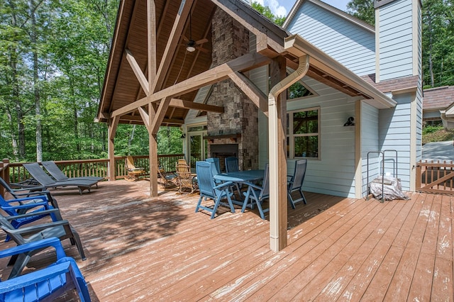 249 Whispering Pine Trl, Murphy, NC 28906 - wooden deck with outdoor dining space and a ceiling fan