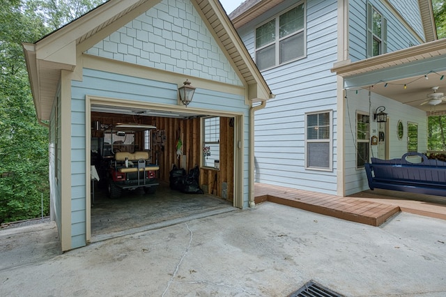 249 Whispering Pine Trl, Murphy, NC 28906 - garage featuring ceiling fan and driveway