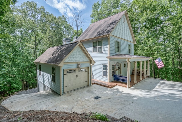 249 Whispering Pine Trl, Murphy, NC 28906 - view of front of property with concrete driveway, covered porch, a chimney, and roof with shingles