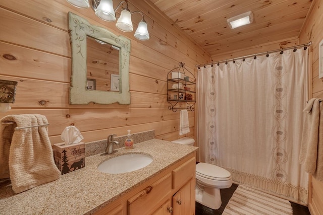 bathroom featuring wooden walls, toilet, a shower with shower curtain, and vanity