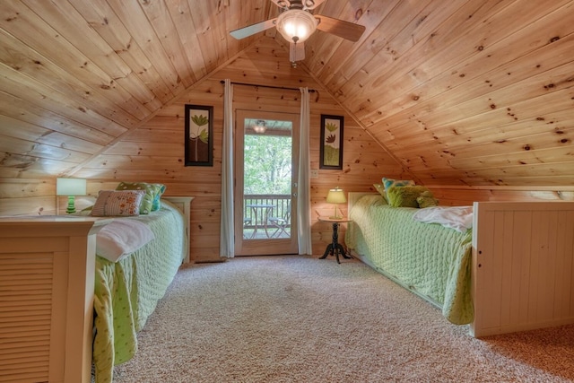 carpeted bedroom featuring access to outside, wood walls, lofted ceiling, and wooden ceiling