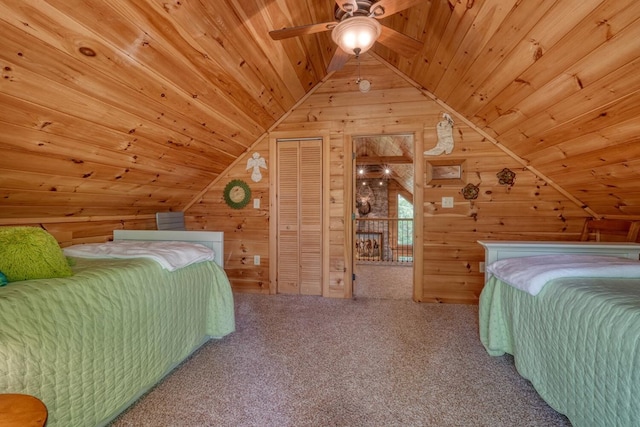 bedroom featuring wooden walls, carpet flooring, ceiling fan, lofted ceiling, and wood ceiling