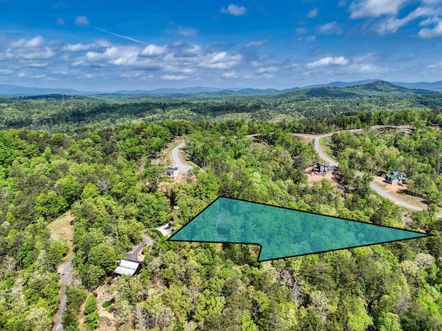 aerial view featuring a forest view