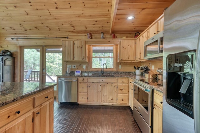 kitchen with wooden ceiling, light brown cabinets, and stainless steel appliances
